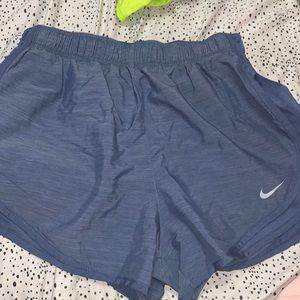 heathered blue nike shorts, size small